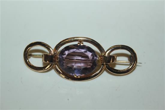 Gold and amethyst brooch